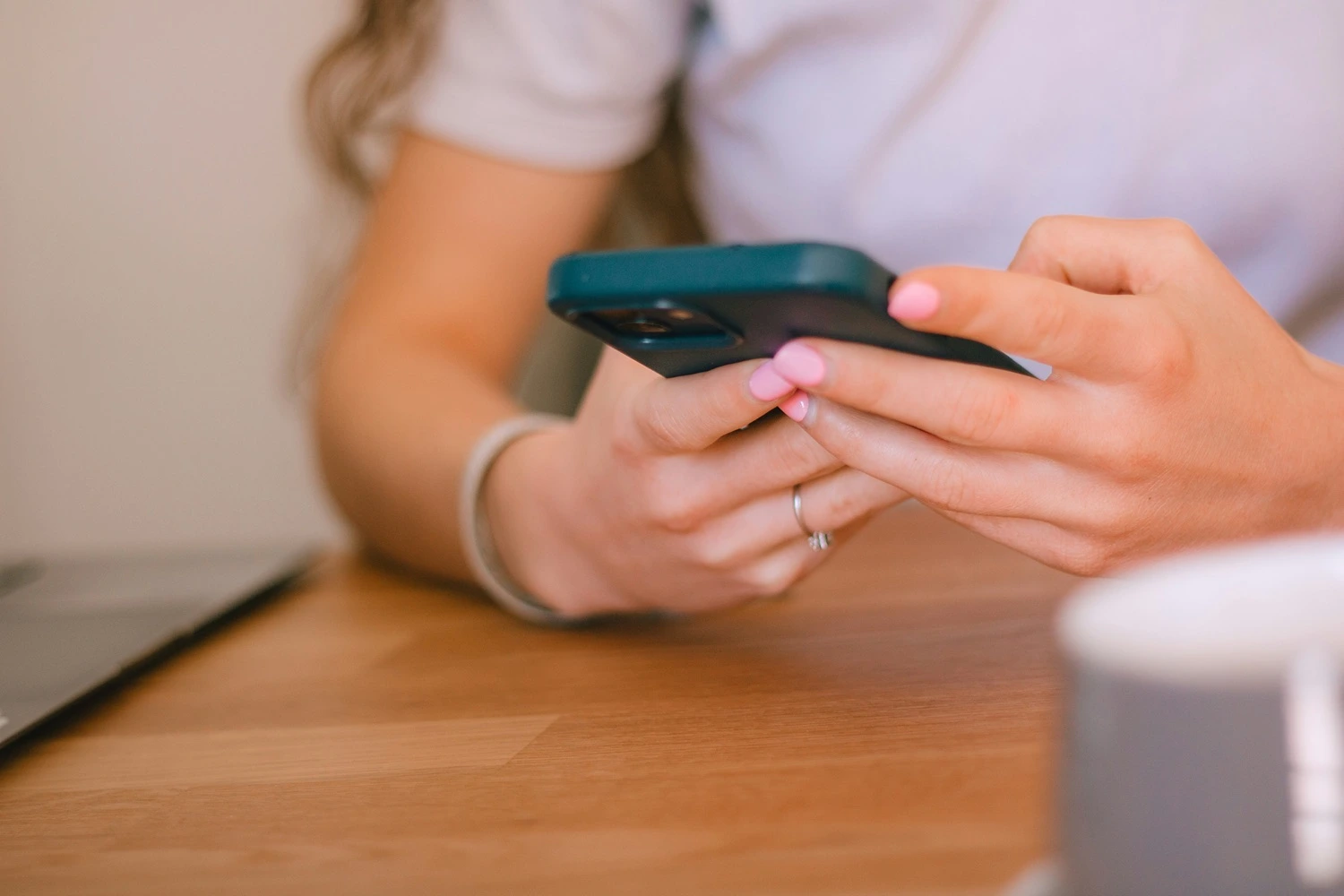 Photo of a woman looking at her phone